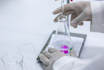 Acid-base reaction titration in Laboratory.