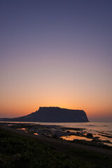 Beautiful sunrise at Seongsan Ilchulbong Peak in Jeju Island, South Korea