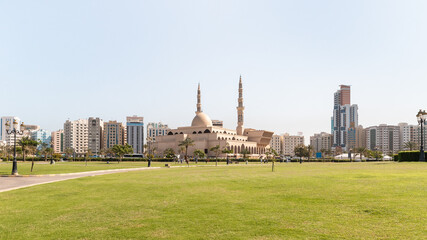 View from the Al Ittihad Park to the King Faisal Mosque in Sharjah city, United Arab Emirates
