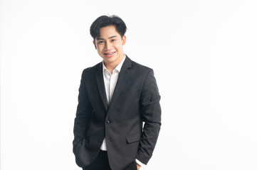 Portrait of smiling businessman standing on white background.
