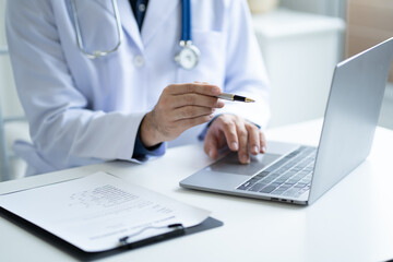 Close up view of professional physician consulting with male patient, talking to male client at medical checkup visit