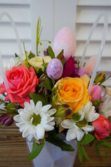 Happy easter! Flat Lay, Internet banner, postcard on Easter.  Bouquet of flowers and Easter eggs