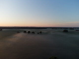 Majestic Morning: Aerial View of Enchanting Misty Landscape in Northern Europe