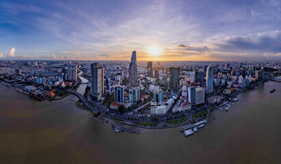 Fototapeta premium Sunset in the Saigon riverside, Ho Chi Minh city, Vietnam. Photo taken in February 2023.
