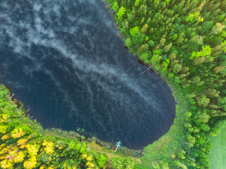 Majestic Morning: A Drone's Eye View of a Misty Lake in the Woods at Sunrise in Northern Europe
