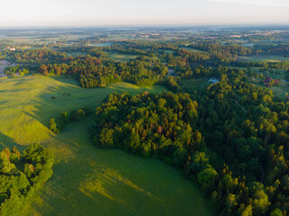 Mystical Sunrise Drone View of Lush Green Landscape of Northern Europe