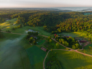 Mystical Sunrise Drone View of Lush Green Landscape of Northern Europe