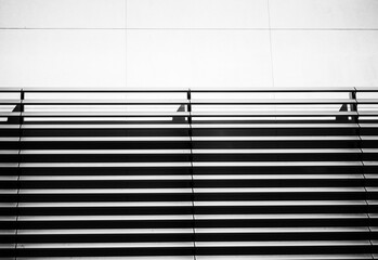 Staircase to a Walkway in Bright Sunlight with Shadows.