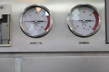 industrial control panel with pressure gauges