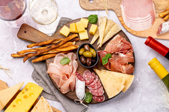 Antipasto board with various meat and cheese snacks