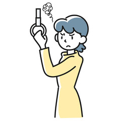 つり革につかまってこちらを睨む女性の上半身