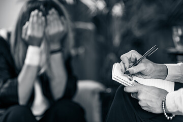 Psychology Concept. Psychotherapist Taking Notes During Session