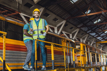 happy worker engineer male working heavy industry  locomotive service staff smiling enjoy at work
