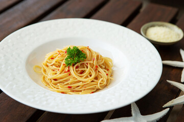 Peperoncino oil pasta on a plate	