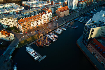 Fototapeta premium Gdansk city in Poland with view on Motlaca river. Historical center in old town in european city, aerial view. Panoramic skyline of modern european city