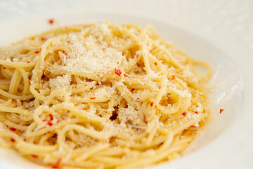 Peperoncino oil pasta on a plate