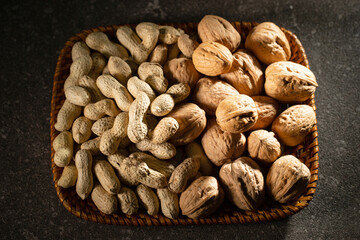 Peanuts and walnuts on a plate