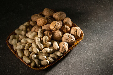Peanuts and walnuts on a plate