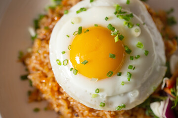 sunny-side up egg over fried rice