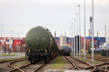 Fototapeta na wymiar Tank wagons waiting for loading with chemicals in the port of Rotterdam