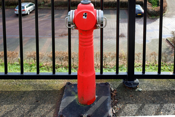 Fire hydrant on platform at train station Nieuwerkerk aan den IJssel
