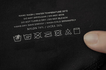 washing instructions on leggings, fabric composition: 74% nylon and 26% lycra