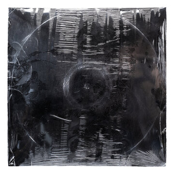 Black old vinyl record cover wrapped in plastic