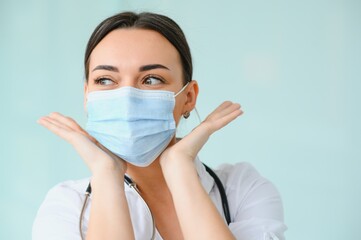 portrait of female doctor wearing protective mask.