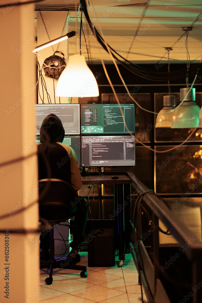 Poster young man working on cracking database passwords to access sensitive information, using malware and 