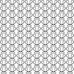 Repeating hare or rabbit heads form a cartoon background