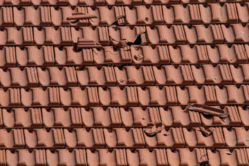 Destroyed ceramic roof tiles background