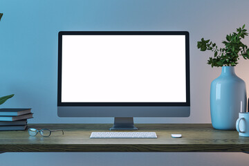 Front view on blank white modern computer monitor with space for web design, website, landing page on wooden work table with eyeglasses and keyboard on dark wall background. 3D rendering, mock up