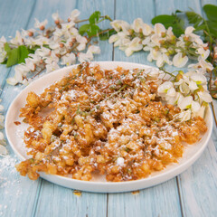 Acacia flowers fritters, Blossoming acacia with leafs, , Robinia pseudoacacia, White acacia, High quality photo