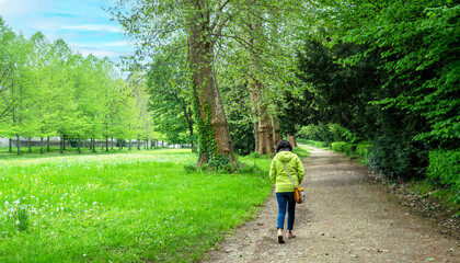 woman walking in the park, spring