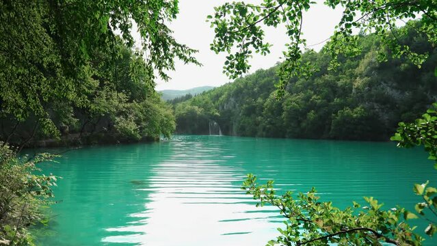 Plitvice Lakes National Park in Croatia. Reserve Plitvice Lakes. High content of calcium carbonate. National park in Croatia. A cascade of 16 lakes connected by waterfalls and a limestone canyon.
