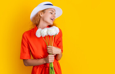 retro summer woman with flowers isolated on yellow, copy space. retro summer woman