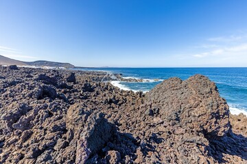 Fototapeta na wymiar Picture over volcanic coast near El Golfo on Lanzarote