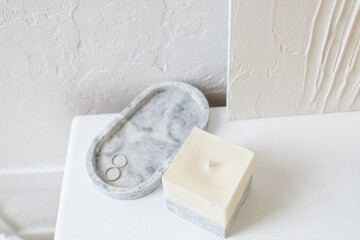 Concrete candle holder in the interior