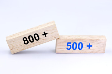 Inscription 800 and 500 plus on wooden blocks. 800 plus is a new version of 500 plus, state program in the field of social policy.