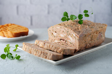 Chicken terrine. Chicken meat pate with fresh parsley