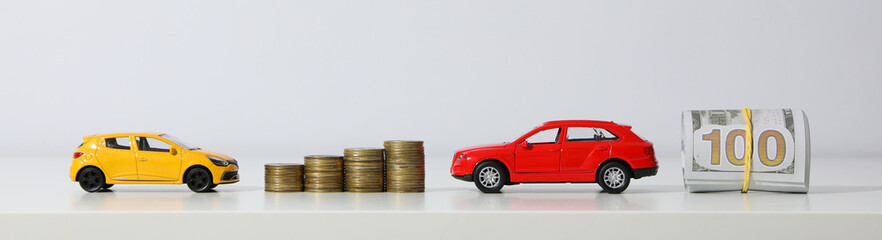 Concept of car purchase and insurance with toy car