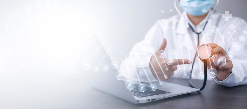 Medical doctors hands working Laptops with the modern interface as a medical network concept, DNA molecule research on the white background concept, Creation technologies for connection Mixed media