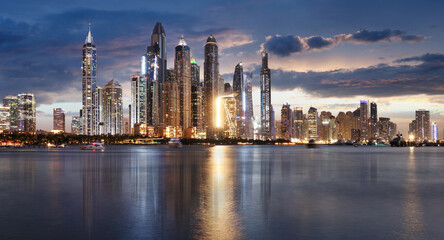 Fototapeta na wymiar Dubai Marina skyline panorama at night, Unites Arab Emirates