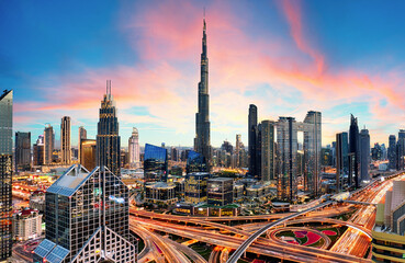 Amazing skyline of Dubai City center and Sheikh Zayed road intersection, United Arab Emirates - obrazy, fototapety, plakaty