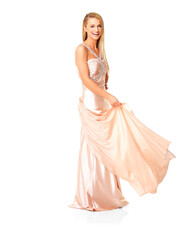 Fototapeta na wymiar Beauty, fashion and elegant prom dress on young woman feeling happy, playful and beautiful in evening gown with copy space. Portrait of a laughing woman choosing the perfect prom or bridesmaid outfit