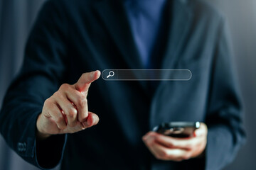 Businessman using a Smathphone for analysis SEO Search Engine Optimization Marketing Ranking Traffic Website Internet Business Technology Concept.