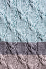 Unusual Abstract turquoise gray knitted pattern background texture. Top view of knitting clothes