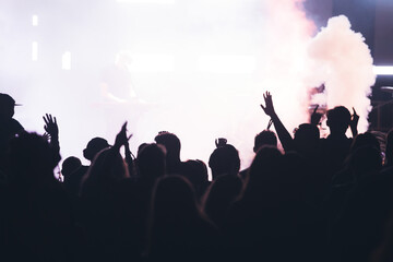 Crowd at concert and blurred stage lights. - obrazy, fototapety, plakaty
