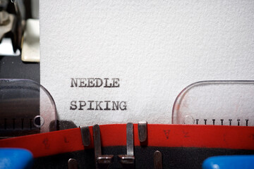 Needle spiking text