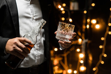 Barman pouring whiskey whiskey glass beautiful night